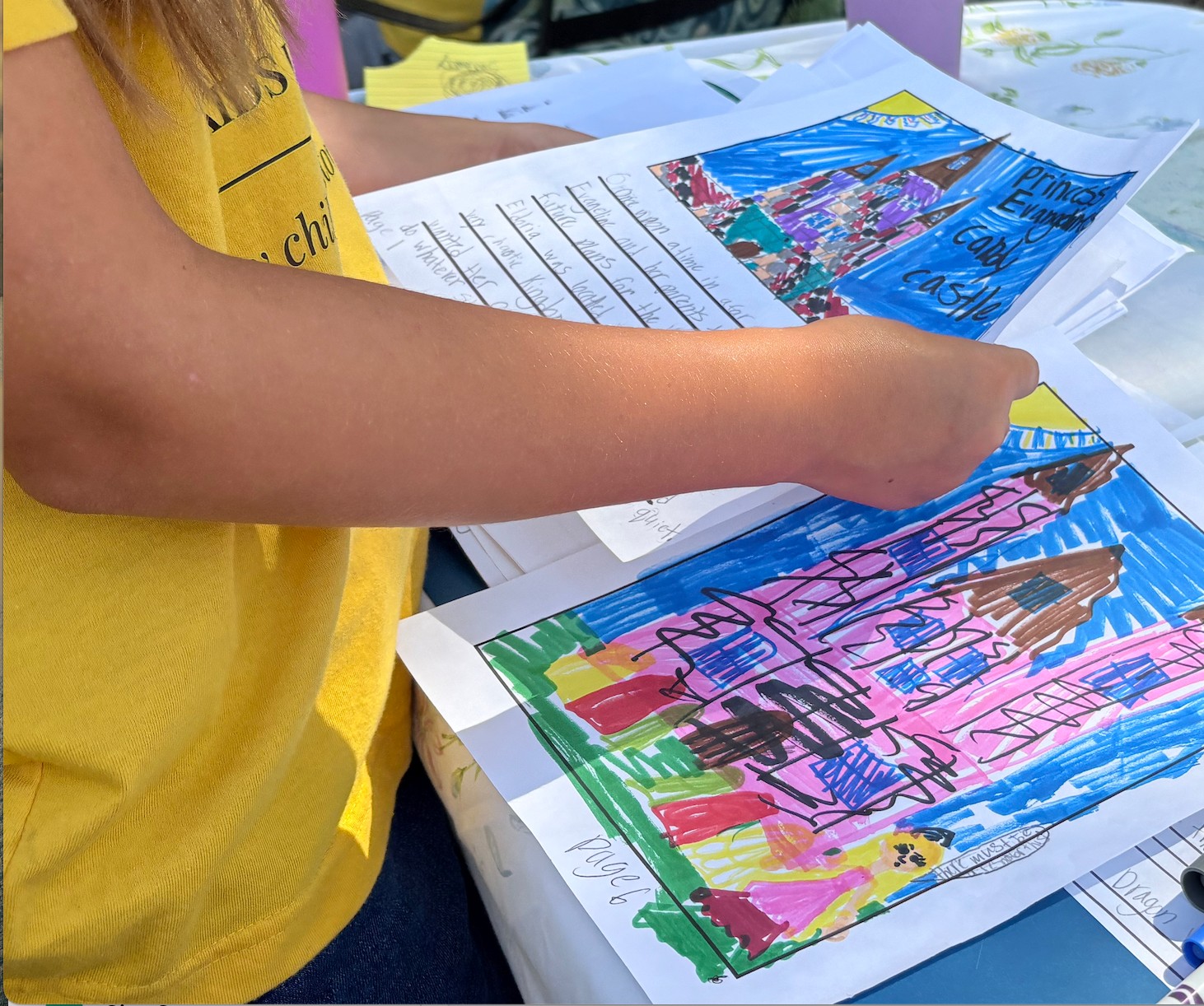 Student sharing their completed illustrated story